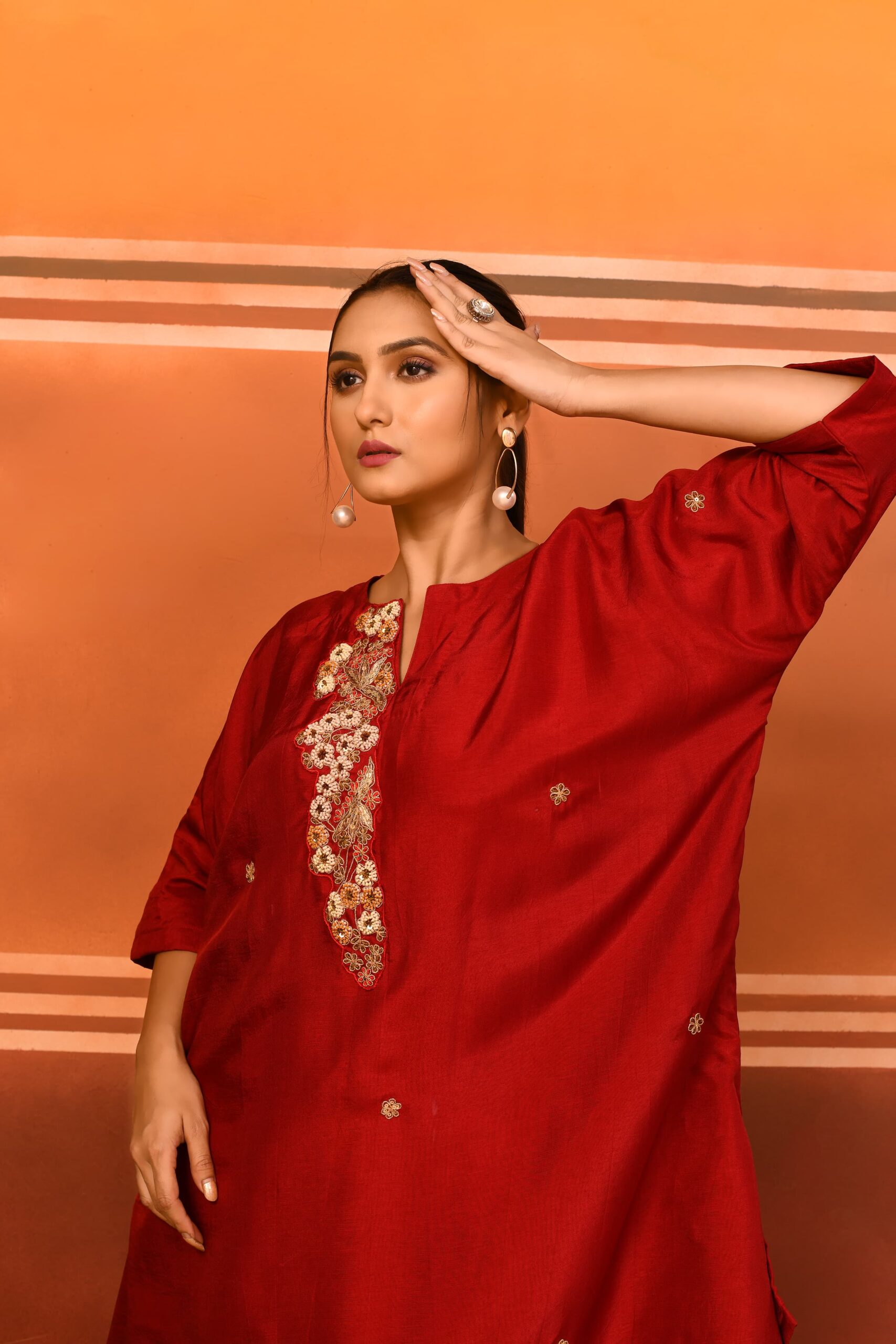 Dahlia Plackett. Maroon